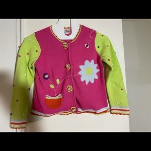 Hanna Anderson.Machine wash  100% cotton.